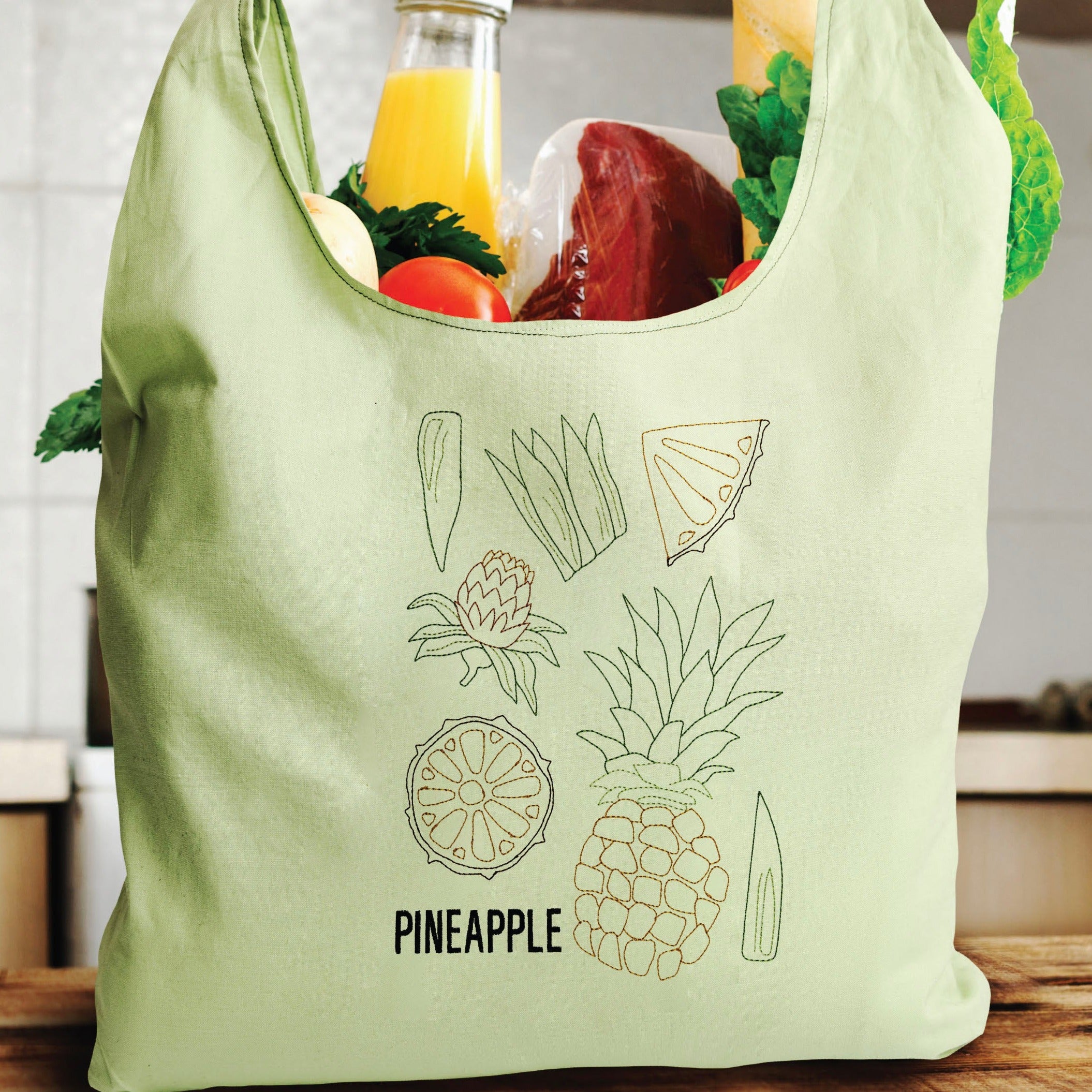 How to repurpose designer shopping bags to make a unique purse 